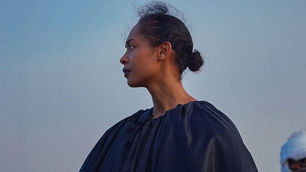 the side profile of the main actress in the on becoming a guinea fowl movie