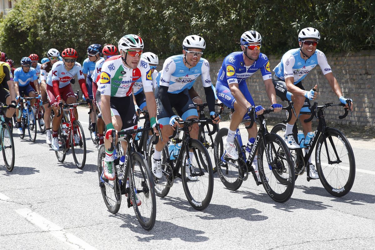 Elia Viviani rides in the peloton