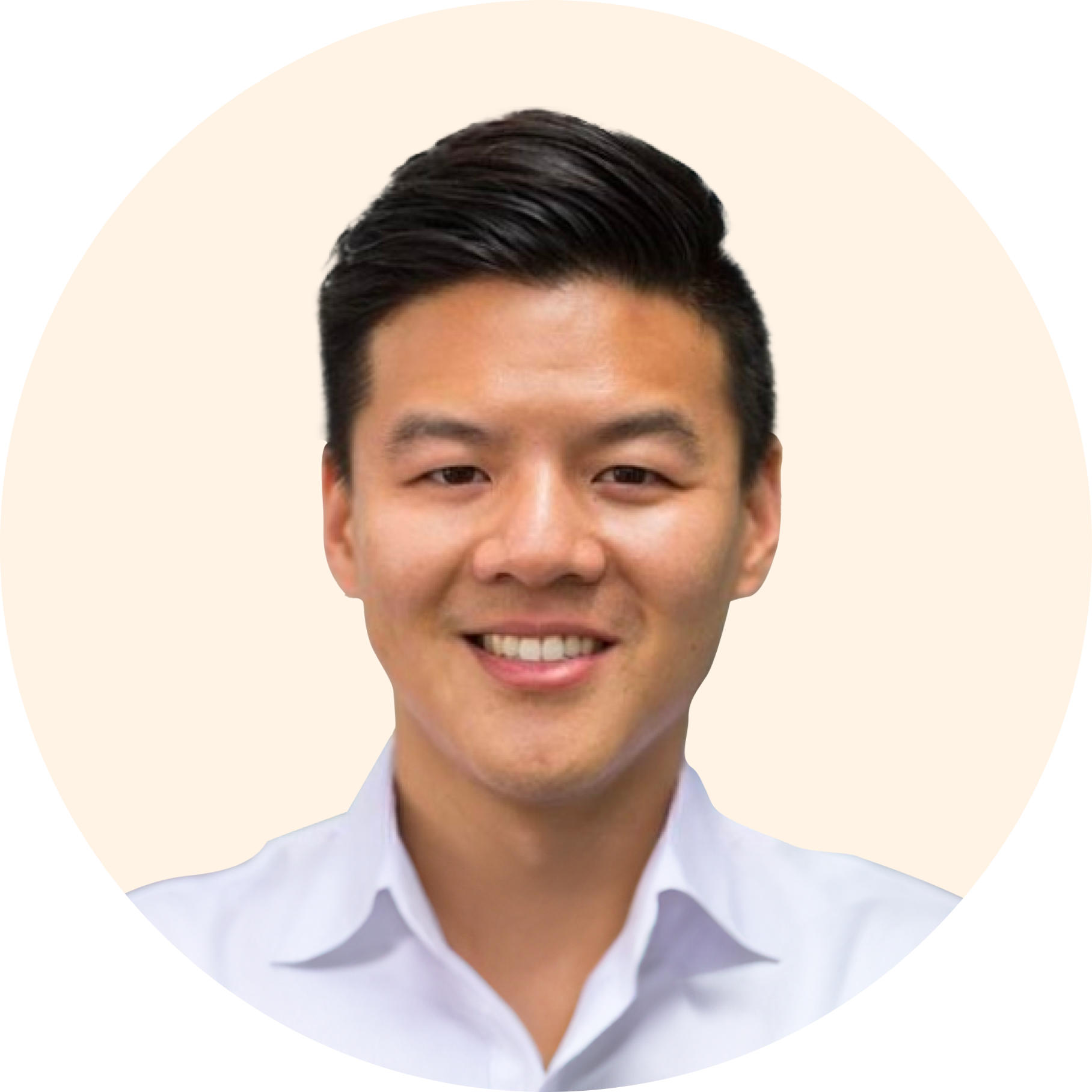 An image showing Dr William Lu, a sleep expert for Dreem Health, smiling at the camera. He's got dark hair and is wearing a white shirt.