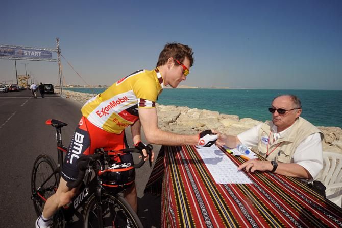 Race leader Brent Bookwalter (BMC) signs on for stage 3.