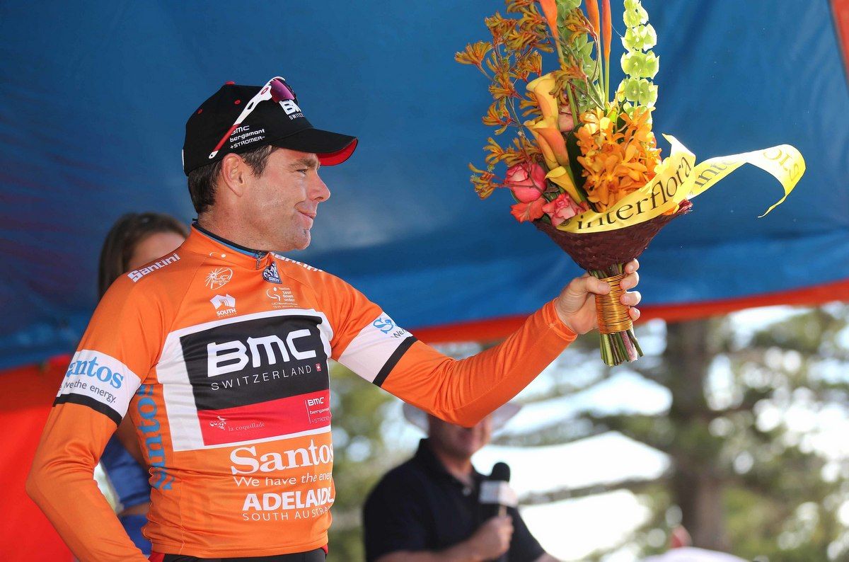 Cadel Evans in the ochre race leaders jersey