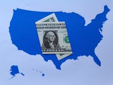 American one dollar bill on the map of United States of America