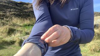 Hiker showing lining of base layer sleeve