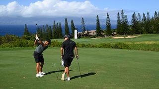 Xander Schauffele with his caddie, Austin Kaiser, on the 17th hole prior to The Sentry at The Plantation Course at Kapalua