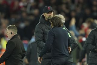 Jurgen Klopp, left, and Antonio Conte shake hands at the end of Saturday's match