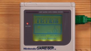A Gameboy Playing Tetris With Another Player Over The Internet