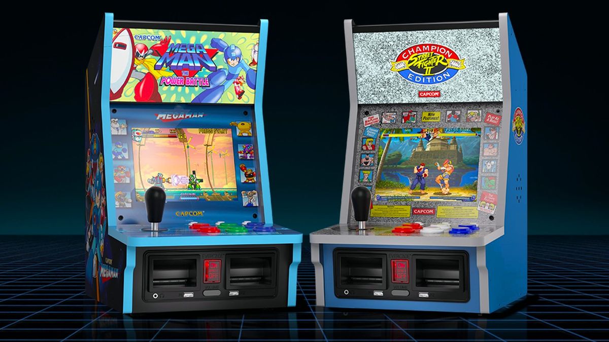 Evercade Alpha Mega Man and Street Fighter arcade cabinets with wire grid backdrop