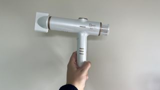 Beauty Works Aeris hair dryer with nozzle attached