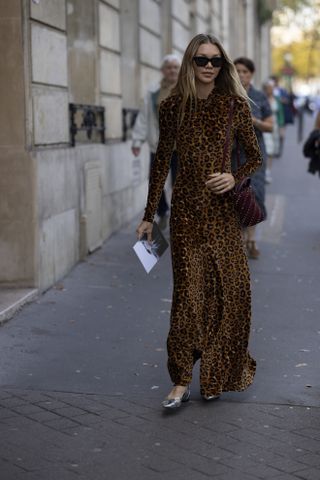 woman wearing leopard print dress