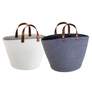 white and blue basket with brown handles
