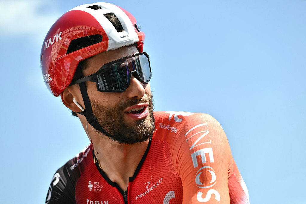 Team Ineos&#039; Italian rider Filippo Ganna arrives to compete in the first stage of the Vuelta a Espana, a 183 km race between Torino - Reggia di Venaria and Novara, in Italy&#039;s Piemonte region, on August 23, 2025. (Photo by Marco BERTORELLO / AFP)