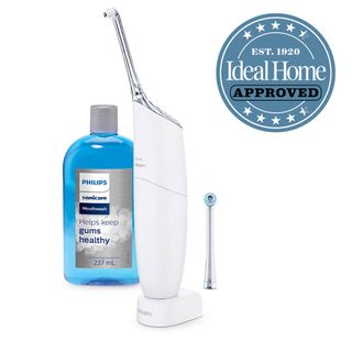 Philips Sonicare AirFloss Pro dental flosser with blue mouthwash
