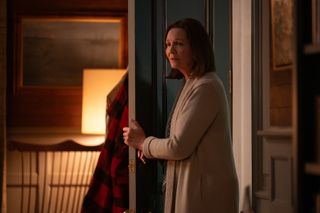 joan allen walking into an office in a still from zero day