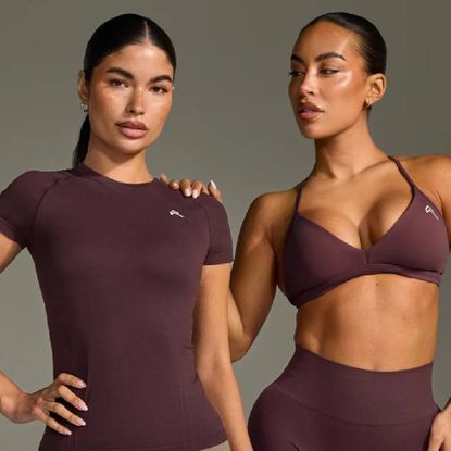 Two models wearing matching plum brown sets from Oner Active