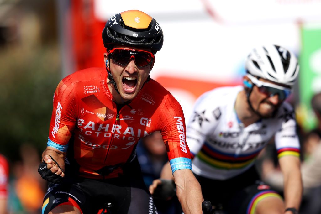 AMURRIO SPAIN APRIL 06 Pello Bilbao Lpez De Armentia of Spain and Team Bahrain Victorious celebrates at finish line as stage winner ahead of Julian Alaphilippe of France and Team QuickStep Alpha Vinyl during the 61st Itzulia Basque Country 2022 Stage 3 a 1817km stage from Llodio to Amurrio itzulia WorldTour on April 06 2022 in Amurrio Spain Photo by Gonzalo Arroyo MorenoGetty Images