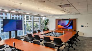 Landsure Systems, a Vancouver-based technology subsidiary, sought to create a dynamic and adaptable meeting room to meet the needs of its executive team. 