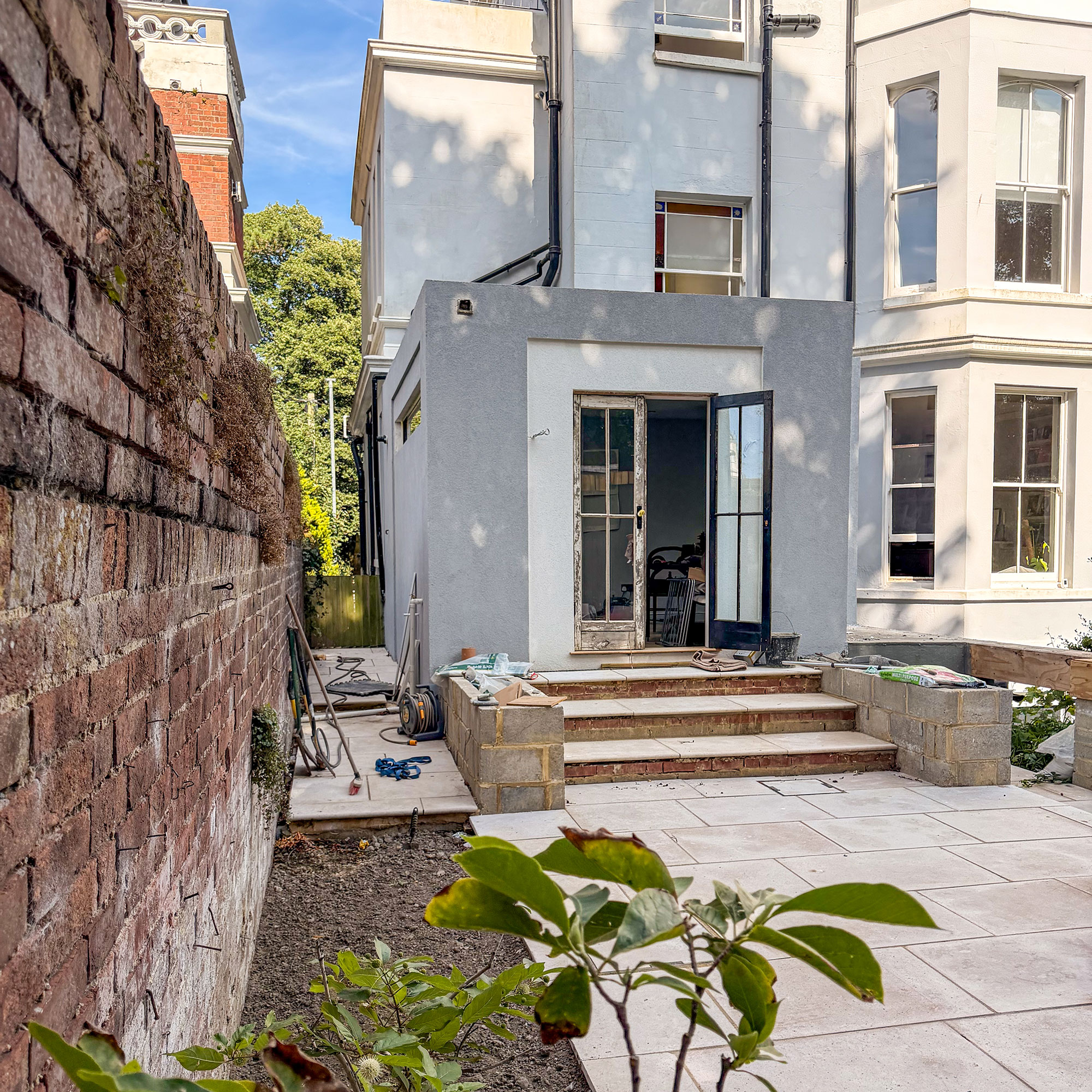 Extension being built onto side of period home