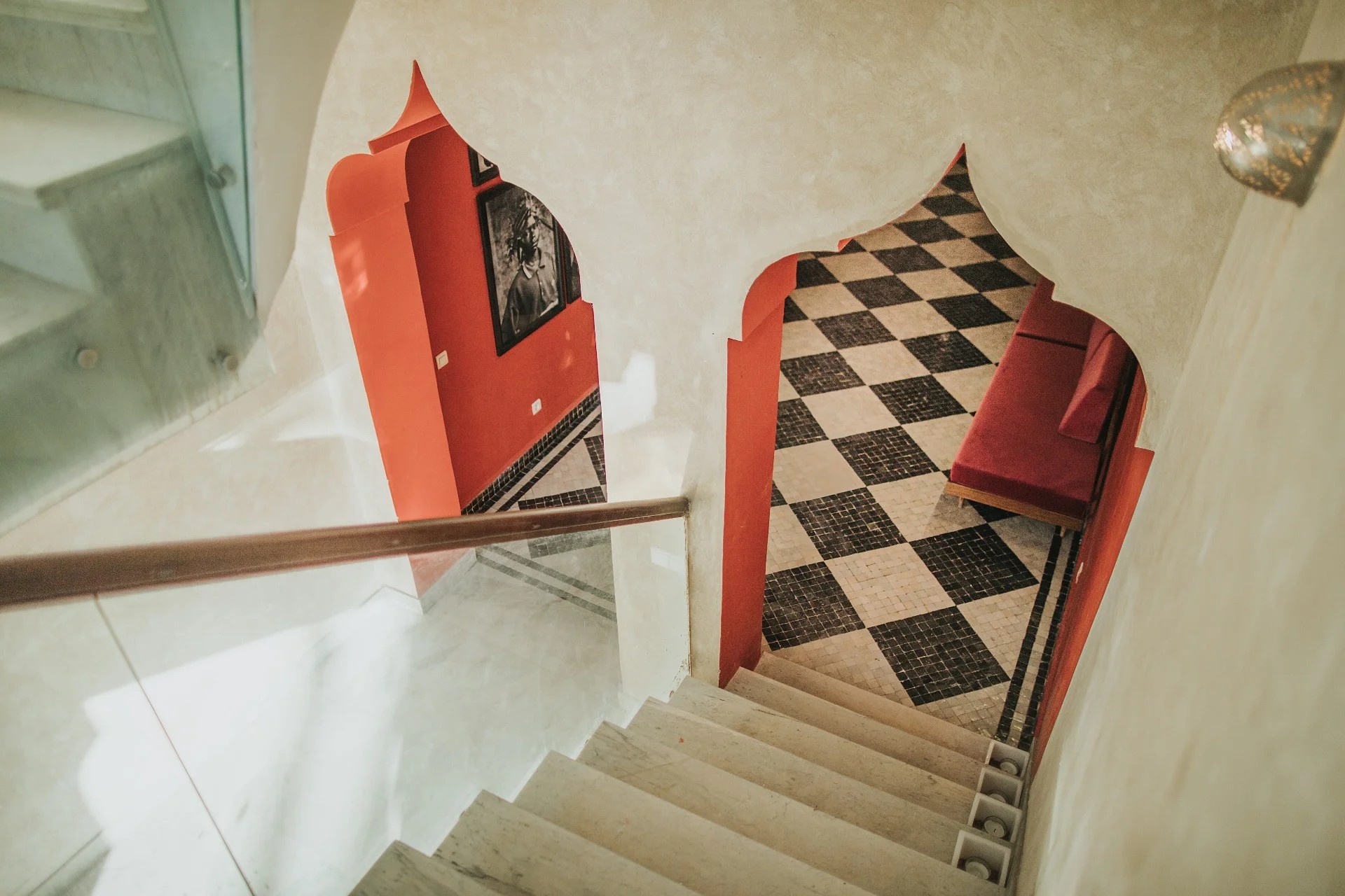 A colorful Moroccan riad has been transformed into a kaleidoscope of patterned textiles, striking artwork, and eye-catching tiles.
