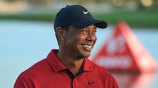 Tiger Woods smiles at the presentation of the 2022 Hero World Challenge