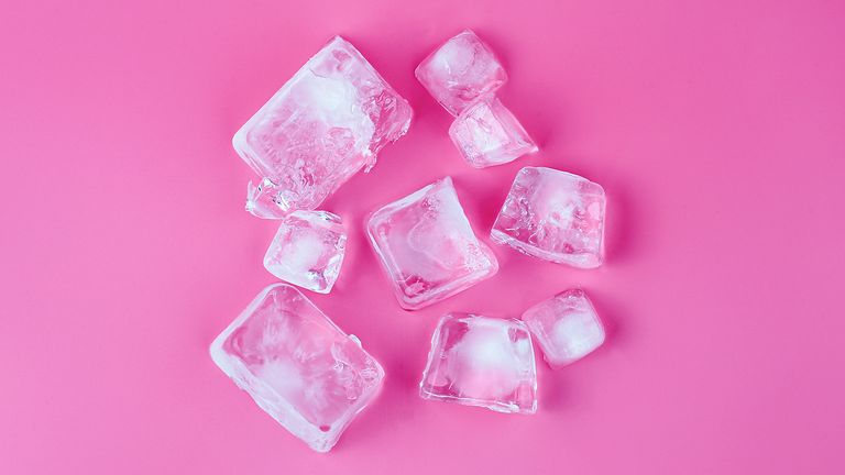 ice cubes on pink background, ice globes for face