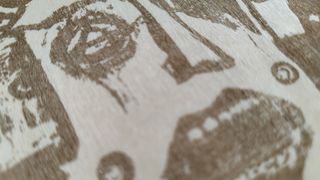 LaserPecker 4 review; a close up of an engraved piece of wood
