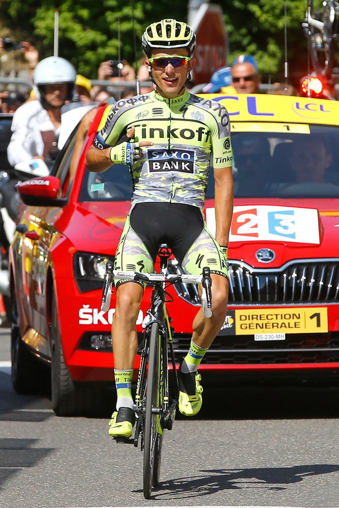Rafal Majka celebrates his stage 11 win at the finish line.