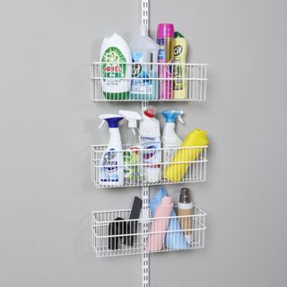 Cleaning supplies organised on three tier shelf unit