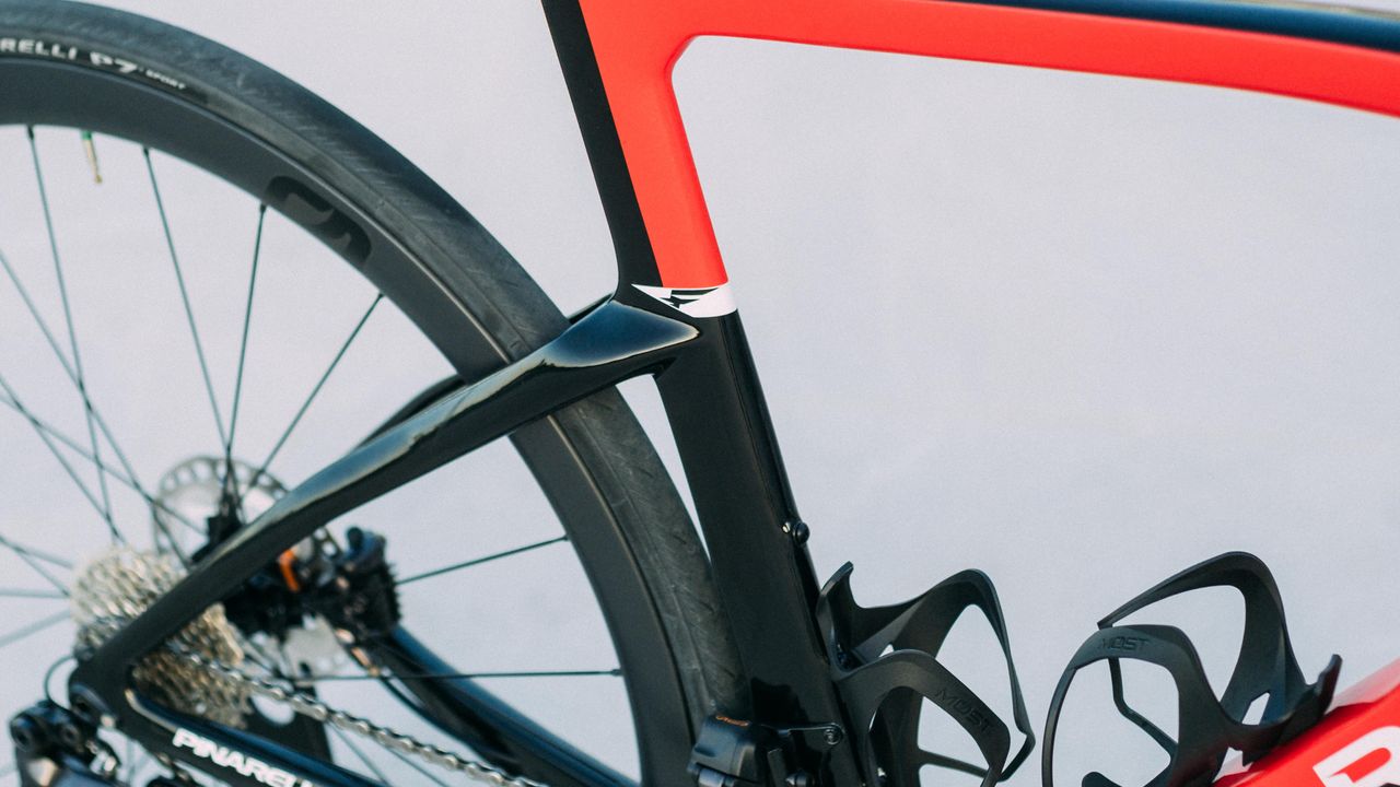 A red and black pinarello F road bike