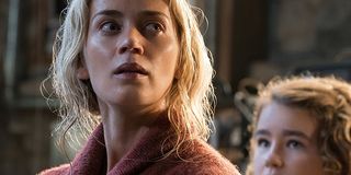 A Quiet Place Emily Blunt Millicent Simmonds Lee and Reagan keep watch for danger