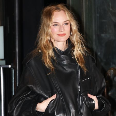 Diane Kruger wearing a leather bomber jacket in Paris