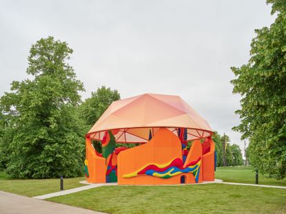 play pavilion, a colourful structure in the greenery of london