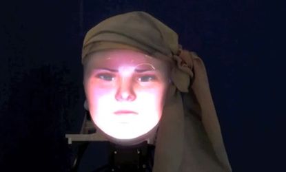 Mask-Bot projects a human face onto a robot, a technology that might be used to keep lonely elderly people company.