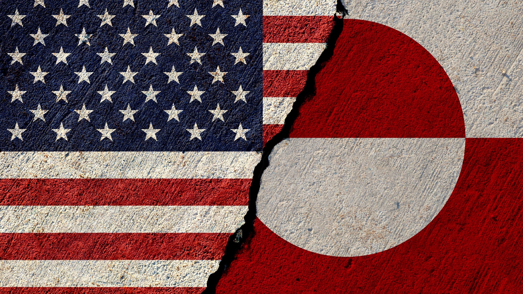 usa and greenland flags painted on concrete wall