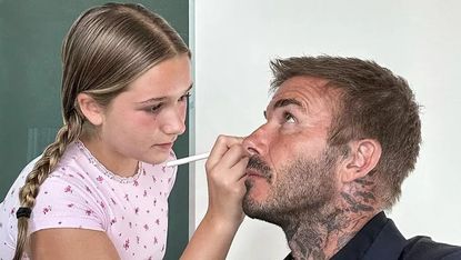 David Beckham getting his makeup done by daughter Harper
