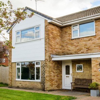 brick house with white front door