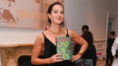 Elizabeth Day holding new book, One of Us
