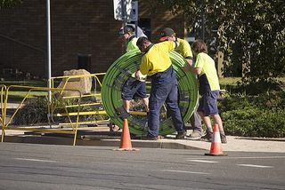 Cable crew laying fiber