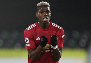 Manchester United&#039;s Paul Pogba celebrates after the final whistle during the Premier League match at Craven Cottage, London. Picture date: Wednesday January 20, 2021.