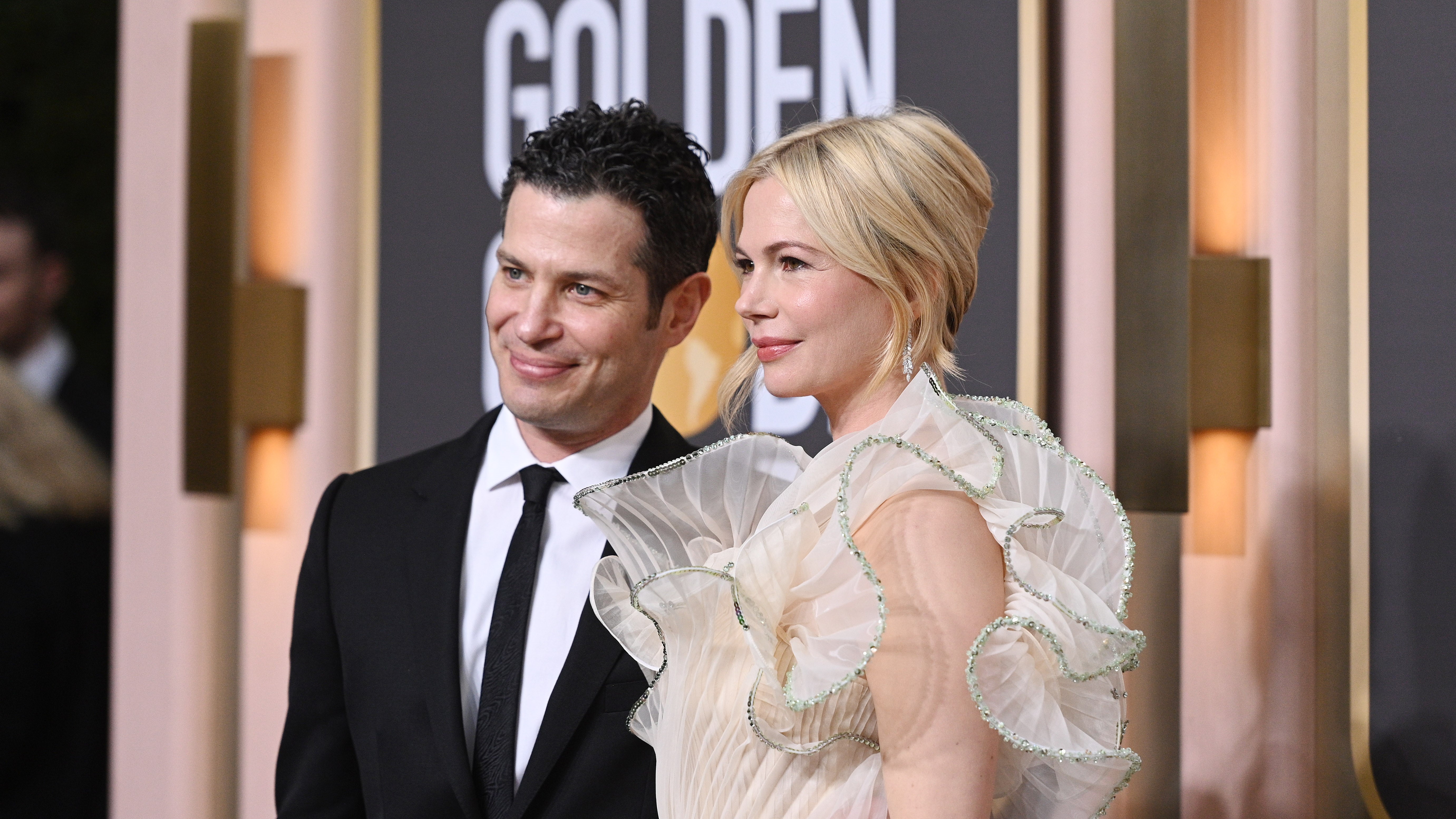 Thomas Kail and Michelle Williams on the Golden Globes red carpet