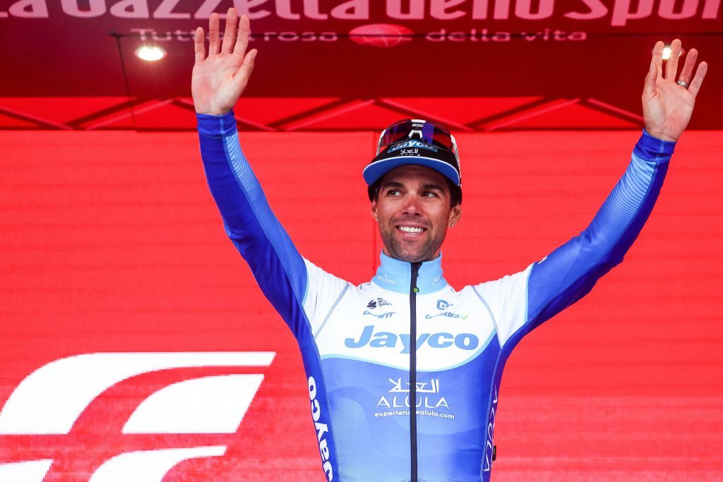Team Jayco AlUlas Australian rider Michael Matthews celebrates on the podium after winning the third stage of the Giro dItalia 2023 cycling race 216 km between Vasto and Melfi on May 8 2023 Photo by Luca Bettini AFP Photo by LUCA BETTINIAFP via Getty Images