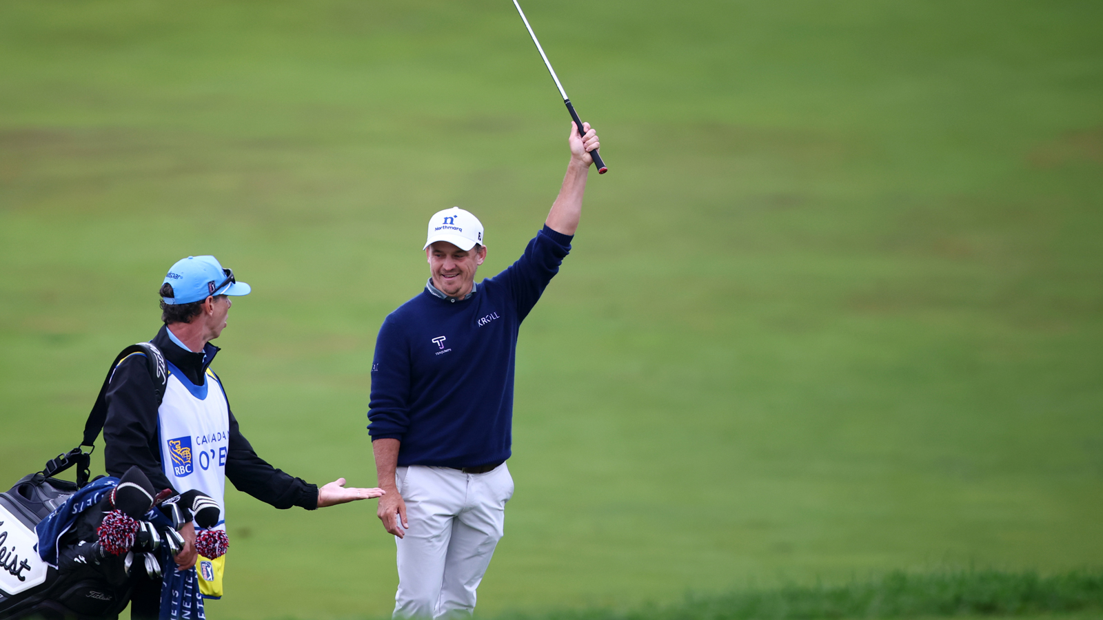 Bud Cauley raises his club in the air