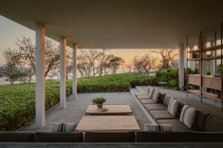 Brandílera House in mexico, a home built around a colonnade and set among green nature