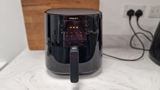 The Philips Essential Air Fryer XL ready to use on the kitchen counter