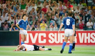 Argentina's Pedro Monzon is shown a straight red card for bringing down West Germany's Jurgen Klinsmann in the 1990 World Cup final.