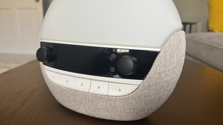 A closer look at the control panel of the Lumie Bodyclock Luxe 700FM sunrise alarm clock.