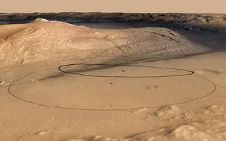 This image shows changes in the target landing area for Curiosity, the rover of NASA's Mars Science Laboratory project. The larger ellipse was the target area prior to early June 2012, when the project revised it to the smaller ellipse centered nearer to the foot of Mount Sharp, inside Gale Crater. Image released June 11, 2012.
