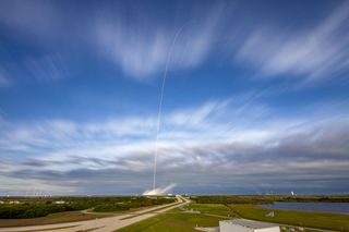 The SpaceX Falcon 9 rocket carrying Qatar's Es'Hail-2 satellite streaks into space in this long-exposure view taken of the launch from Pad 39A of NASA's Kennedy Space Center in Florida on Nov. 15, 2018.