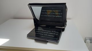 Glide Gear TMP100 on desk with tablet showing script