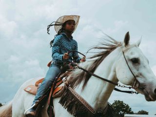 Ivan McClellan photograph of a young Black girl riding a horse