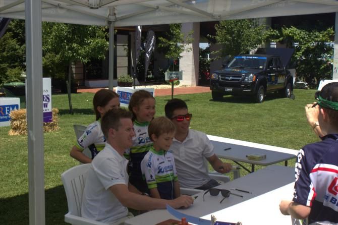 Simon Clarke and Caleb Ewan with fans during the 2014 Orica-GreenEdge River &amp; Ranges Winery Ride